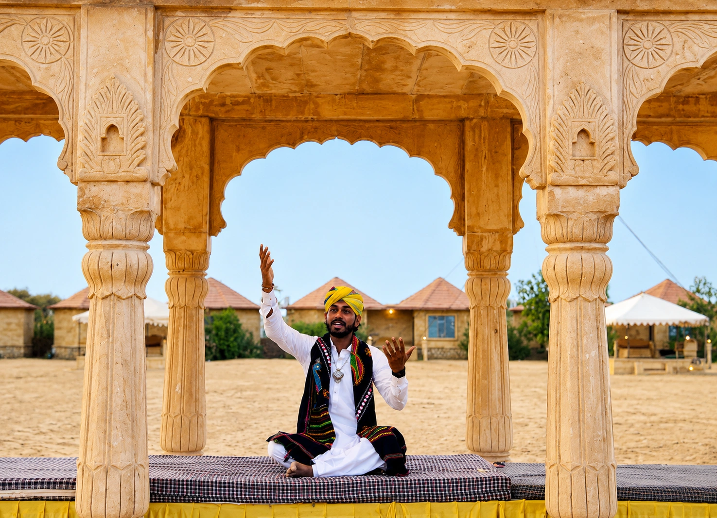 Rajasthani folk singer performing at a desert camp near Jaisalmer